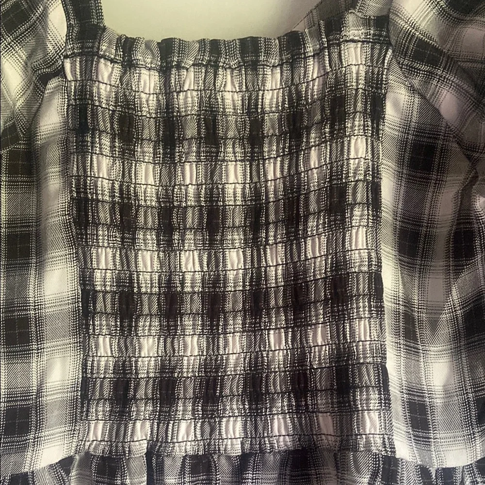 PLEIONE Black and White Peplum Blouse
Size Medium - Picture 7 of 8